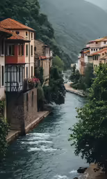 a small river running between two buildings in the mountains