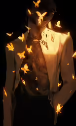 a guy is covered in falling moths on his shirt