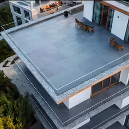 a modern building with a nice concrete patio