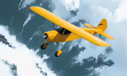 a yellow airplane flying in the sky with its landing gear down