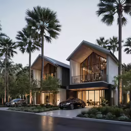 a white and gray house in front of some palm trees