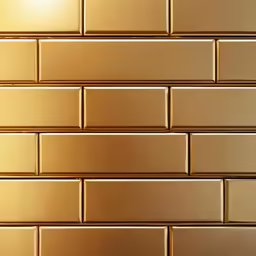 a close up of some gold tiles wall