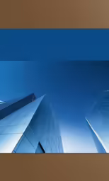 a tall building with two blue windows