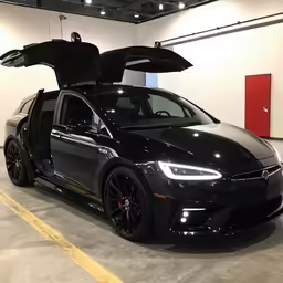 a black car with the hood up and open