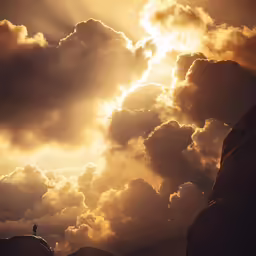 two people on a surfboard in the ocean with clouds