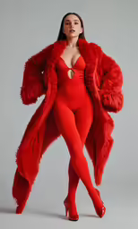 a woman in a red teddy bear costume