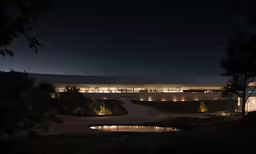 the night time scene of an outside venue and lighting