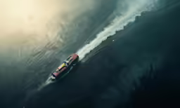 a speedboat sailing through a body of water