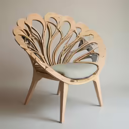 a circular chair sitting on top of a white table