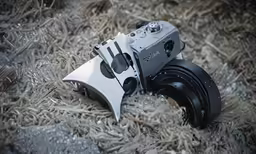 a camera sits in the middle of some carpet