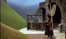 the man is dressed in the old world clothing