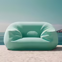an odd looking seat sitting on the sand
