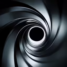 an abstract picture, looking into a dark circular object
