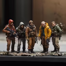 figurines of men with weapons are shown
