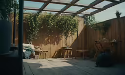 the wood and the walls of a backyard are covered in wooden boards