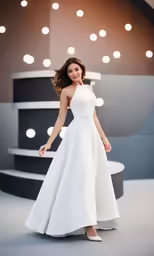 a woman in a long dress poses in front of a light and circular background