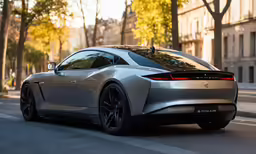 a silver car is shown parked in front of a building