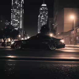the black car is driving down the city street
