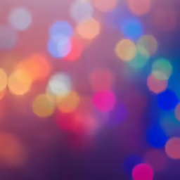 blurry colored lights shine on a blue surface