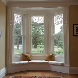 corner window of an elegant sunroom with bench, decorative and rug on the floor