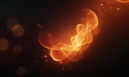 a group of bubbles in the middle of an orange glow