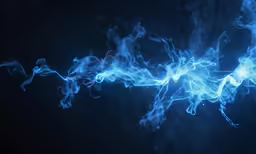 a close up view of a blue fire and ice