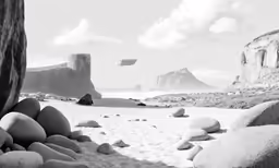 a person sitting on top of a beach near rocks
