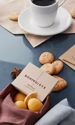 some cookies and coffee on a table