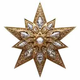 gold toned metal ornament with a flower design
