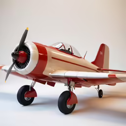 a small airplane sitting on top of a white table