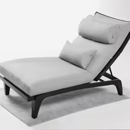 a small modern chaise lounge chair