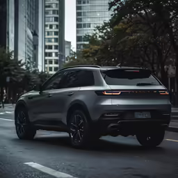 the large suv is driving down the street