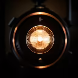 a close up shot of an light in the dark