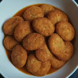 a close up of a bowl filled with food