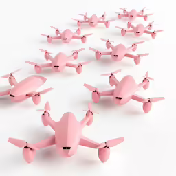 small pink toy airplanes scattered around the image