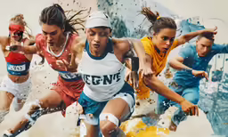 a group of girls kicking a soccer ball
