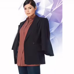 a woman is wearing a blazer, jeans and brown shirt