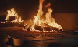a pizza that has been set on fire with the bottom flame out
