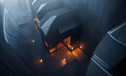 aerial view of an outdoor cityscape, including the building made of concrete, has lit by candles