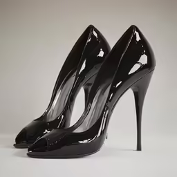 black heels on a white surface