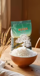a bowl with rice sitting on a table
