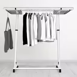 a bunch of clothes are hanging on rack in the room