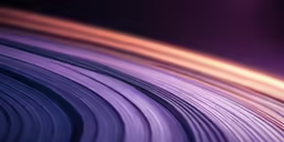a closeup view of purple, yellow, and orange rings