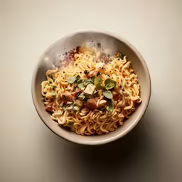 a pasta dish is shown in a bowl