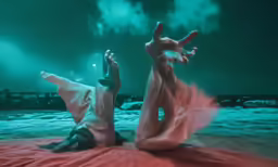 the naked woman in white swimsuit is laying on her stomach