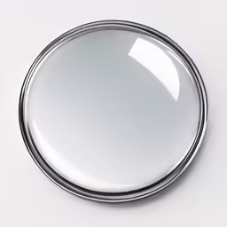 a close up view of a round glass surface