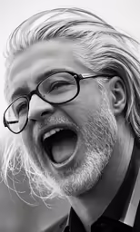 an old man with glasses is shouting