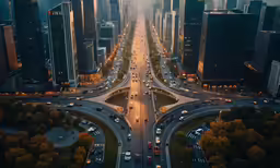 an aerial shot of city traffic at night