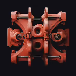 the wheels and hubs on a machine that is made from orange metal