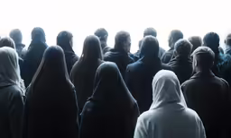 a crowd of people with their backs turned to the opposite